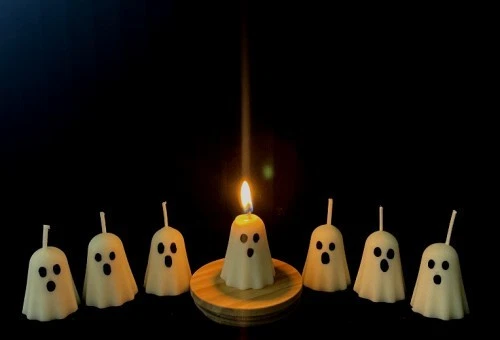 A set of 6- scented Spiced Pumpkin hand-poured soy wax, 2" white ghost Candles